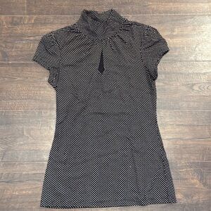 Express short sleeve mock turtleneckk with key hole opening 
Size XS